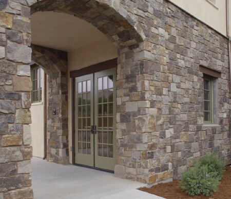 Heritage Series commercial French doors with Bay Leaf exterior finish and PDL bars.