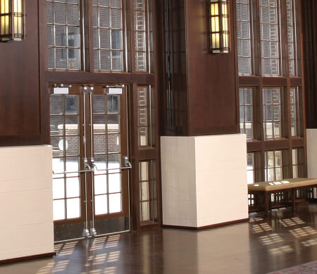 Ultra Series custom outswing commercial doors and studio windows.
